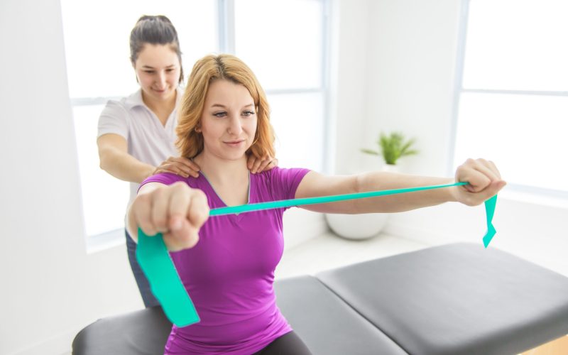 A Modern rehabilitation physiotherapy at work with client